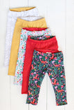 Reversible leggings in folk floral/spicy red