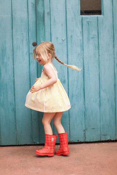 Jumper dress in yellow stripes